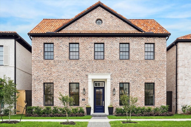 7527 Ciano Ln, Houston, TX 77055 - view of front facade featuring brick siding and a tiled roof