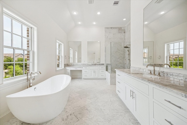 7527 Ciano Ln, Houston, TX 77055 - full bath with vaulted ceiling, a shower stall, healthy amount of natural light, recessed lighting, and a freestanding bath