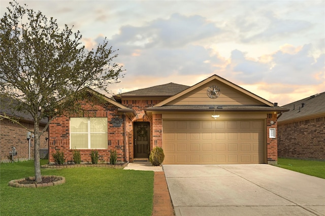 single story home with concrete driveway, brick siding, a garage, and a front lawn