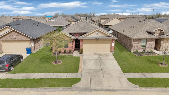 view of front of house featuring a front yard, driveway, roof with shingles, an attached garage, and a residential view