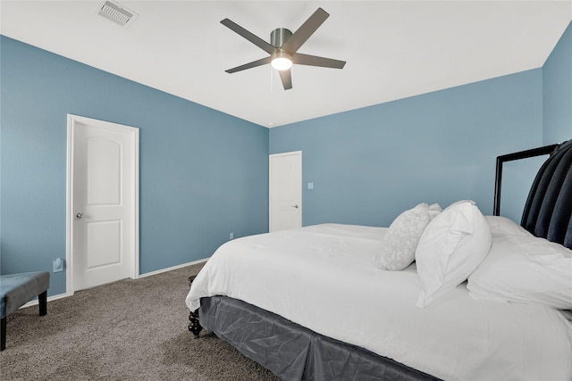 bedroom featuring visible vents, baseboards, a ceiling fan, and carpet flooring