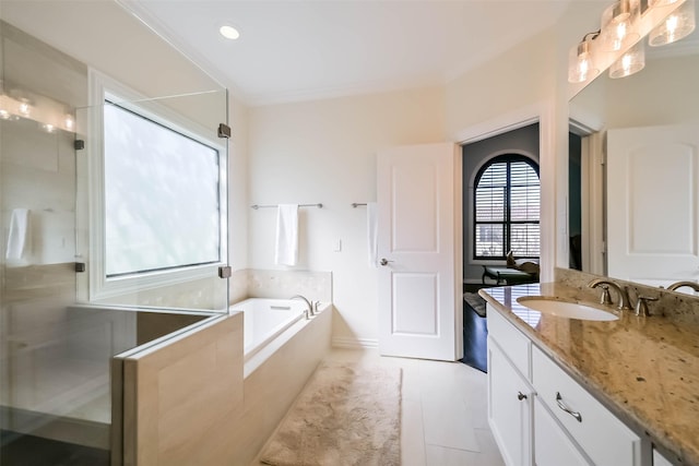 4303 Blossom St, Houston, TX 77007 - bathroom with vanity, a bath, a shower stall, and tile patterned flooring