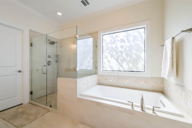 4303 Blossom St, Houston, TX 77007 - full bathroom featuring a stall shower, a garden tub, and tile patterned flooring