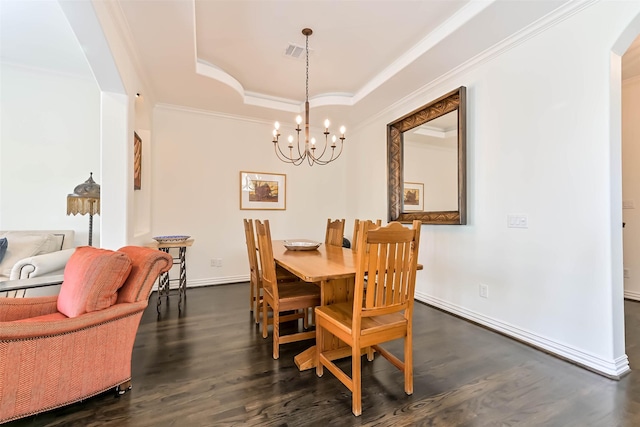4303 Blossom St, Houston, TX 77007 - dining area with ornamental molding, dark wood-type flooring, arched walkways, a chandelier, and a raised ceiling