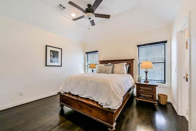 4303 Blossom St, Houston, TX 77007 - bedroom with dark wood-type flooring, baseboards, and ceiling fan