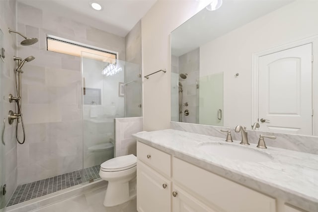 4303 Blossom St, Houston, TX 77007 - bathroom featuring toilet, a shower stall, and vanity