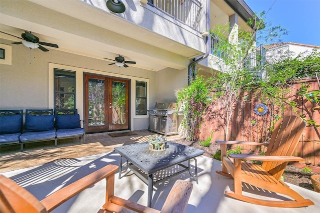 4303 Blossom St, Houston, TX 77007 - view of patio / terrace with french doors, a ceiling fan, a grill, a balcony, and an outdoor living space