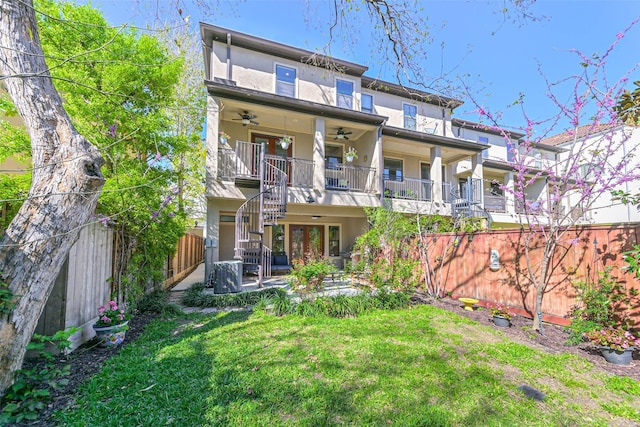4303 Blossom St, Houston, TX 77007 - view of front of property featuring stairs, a ceiling fan, stucco siding, and a patio