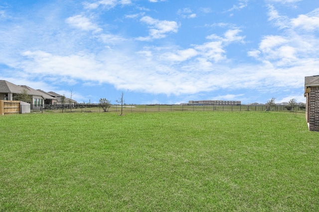 view of yard featuring fence