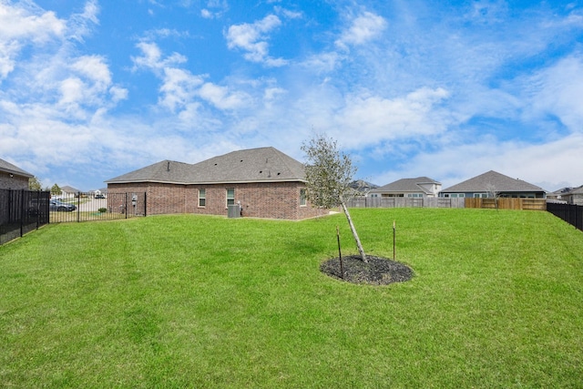 view of yard featuring a fenced backyard