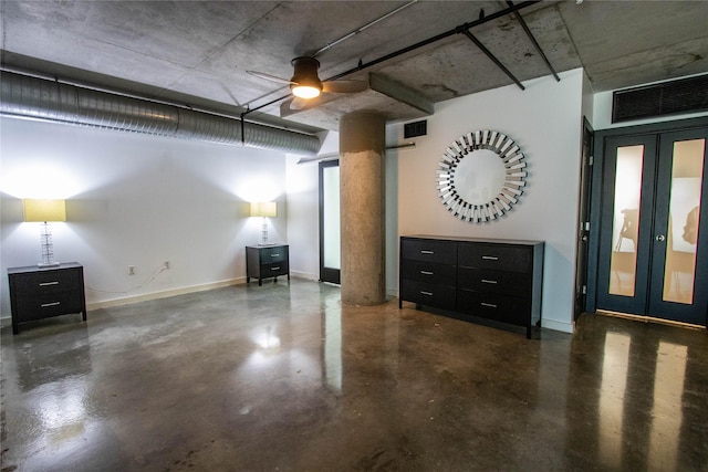 garage featuring visible vents, french doors, baseboards, and a ceiling fan