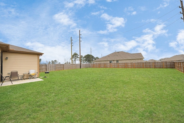 view of yard featuring a patio and a fenced backyard