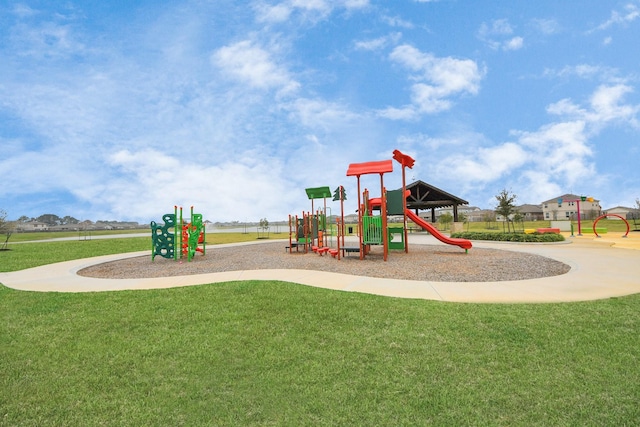 community play area with a lawn