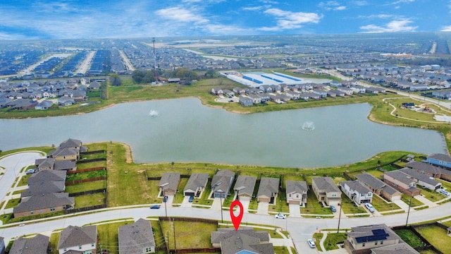 birds eye view of property featuring a residential view and a water view