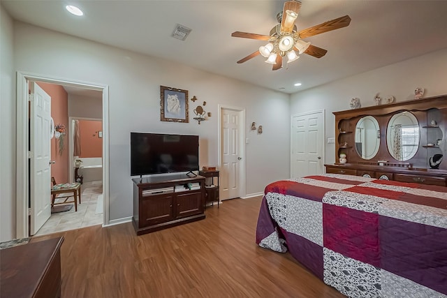 bedroom with visible vents, recessed lighting, ceiling fan, and wood finished floors