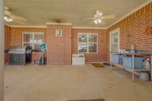 view of patio / terrace featuring a ceiling fan and grilling area