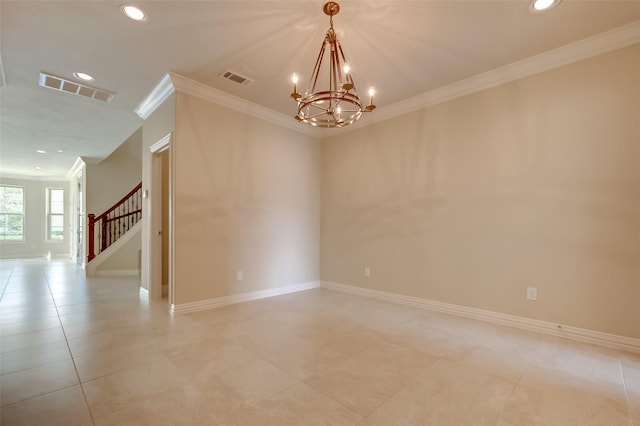 spare room featuring baseboards, visible vents, an inviting chandelier, ornamental molding, and stairs