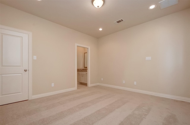 unfurnished room with baseboards, recessed lighting, visible vents, and light carpet