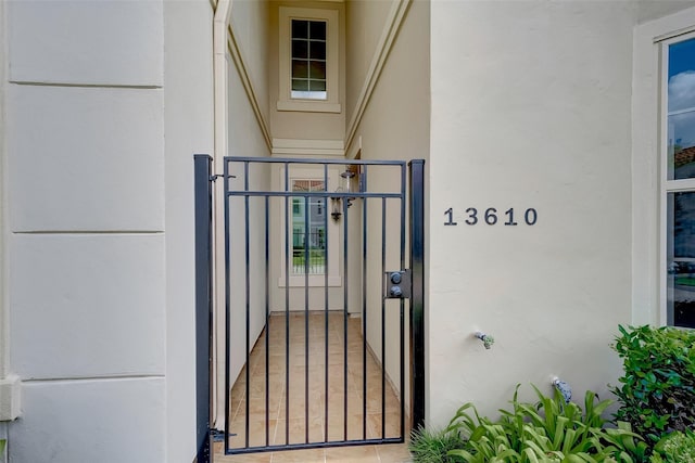 entrance to property with stucco siding