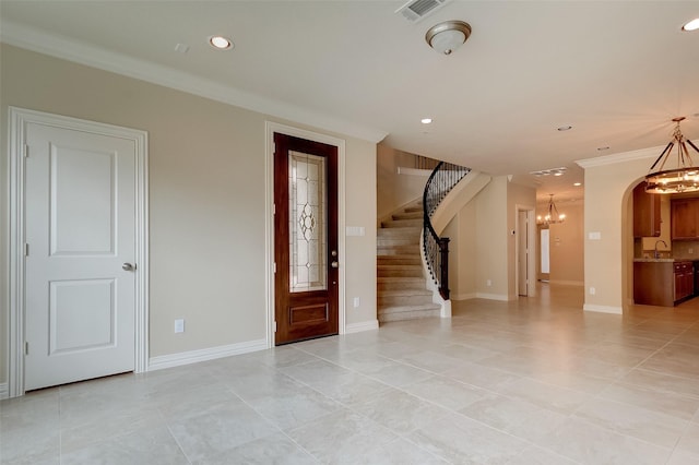 foyer featuring visible vents, baseboards, stairs, recessed lighting, and a notable chandelier