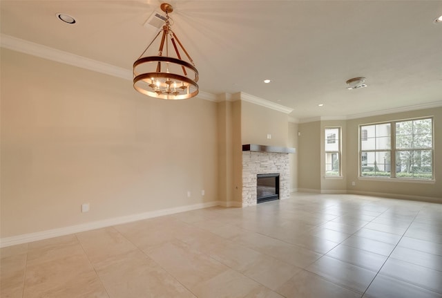 unfurnished living room featuring a fireplace, baseboards, and ornamental molding