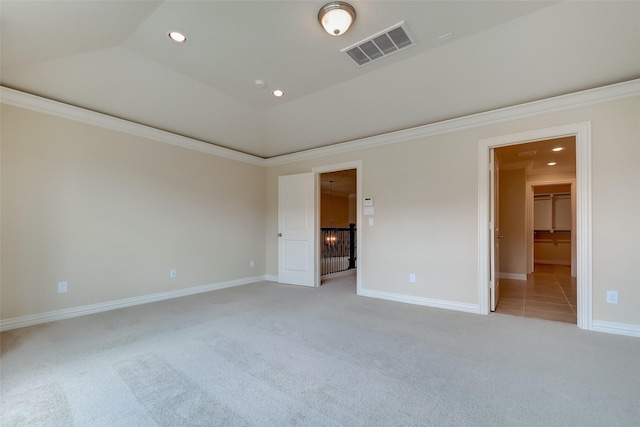 unfurnished bedroom featuring recessed lighting, light colored carpet, visible vents, and baseboards