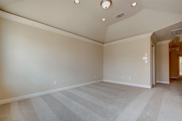 unfurnished room featuring visible vents, attic access, lofted ceiling, recessed lighting, and light colored carpet