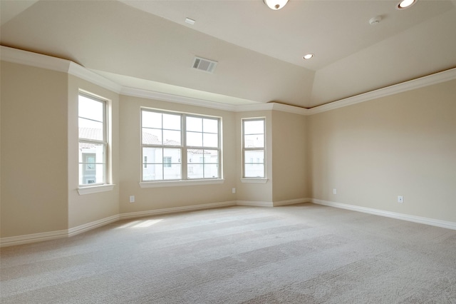 spare room with crown molding, recessed lighting, light colored carpet, and baseboards