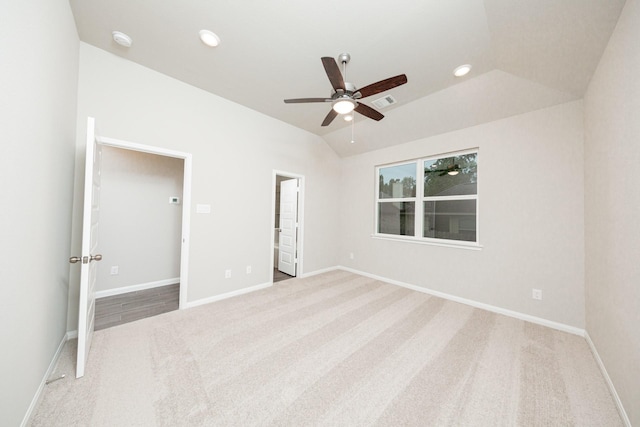 unfurnished bedroom with carpet floors, lofted ceiling, baseboards, a ceiling fan, and recessed lighting