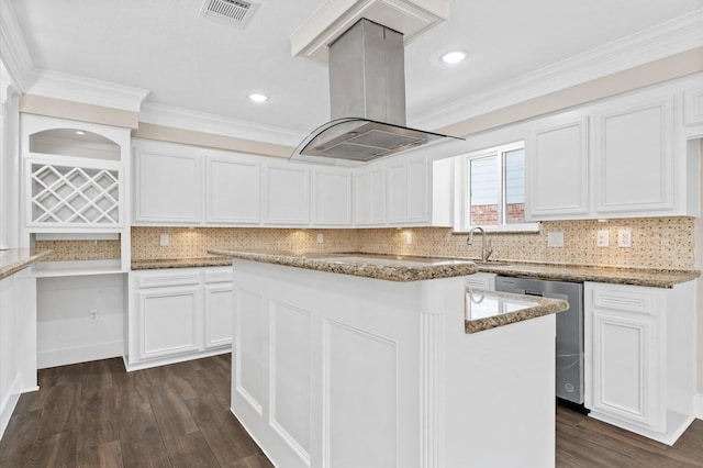 kitchen featuring island range hood, dishwasher, white cabinets, light stone countertops, and visible vents