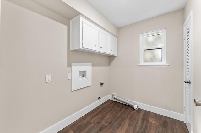 clothes washing area with baseboards, washer hookup, hookup for a gas dryer, cabinet space, and hookup for an electric dryer