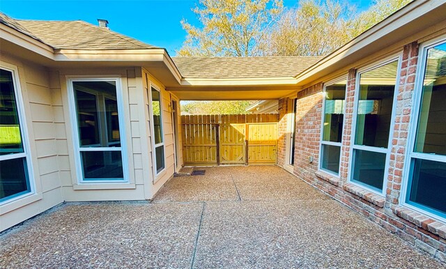 view of patio / terrace with fence