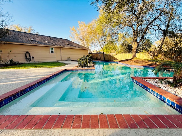 view of pool featuring a fenced in pool and a fenced backyard