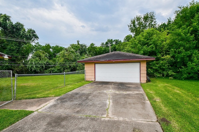 detached garage with fence