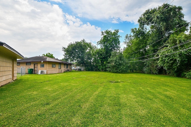 view of yard with fence