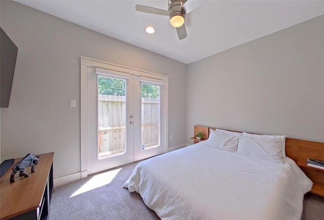 bedroom featuring french doors, carpet, ceiling fan, and access to outside