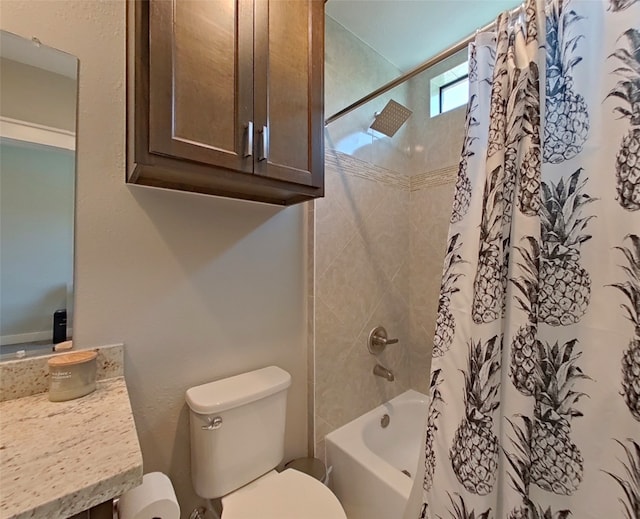 bathroom with vanity, toilet, and shower / bath combo