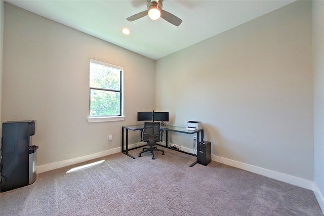 home office featuring a ceiling fan, carpet, and baseboards