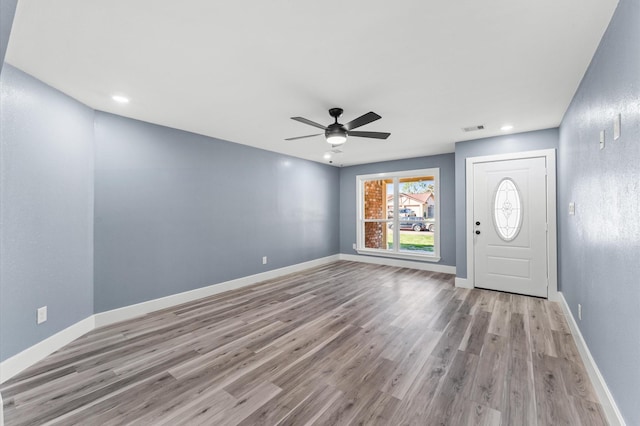 entrance foyer with visible vents, baseboards, ceiling fan, recessed lighting, and wood finished floors