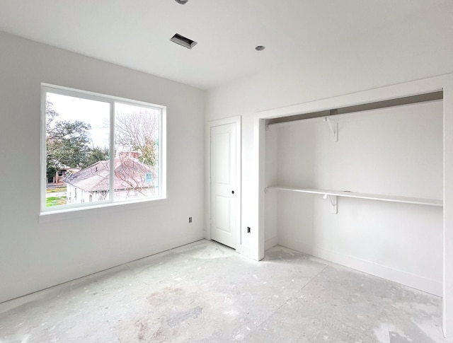 unfurnished bedroom featuring a closet