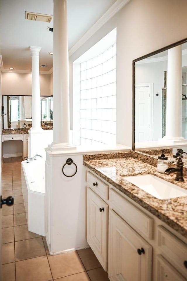 bathroom with visible vents, ornate columns, a sink, crown molding, and tile patterned floors