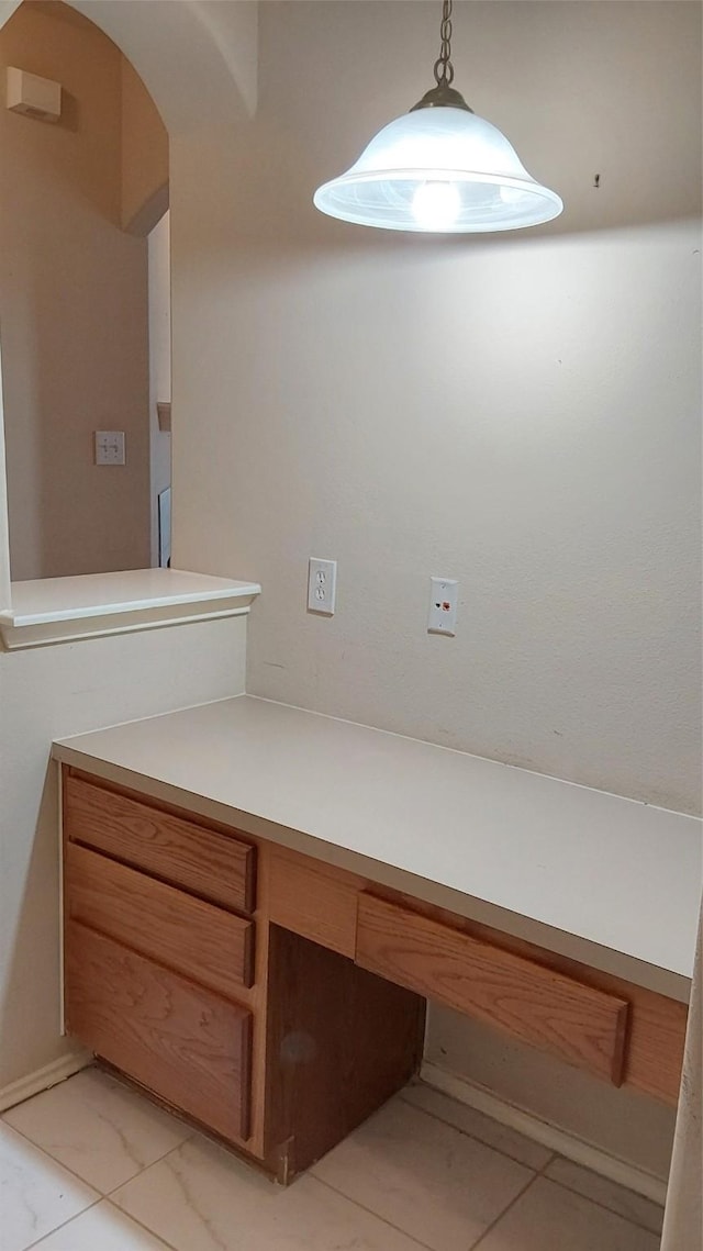 bathroom featuring marble finish floor