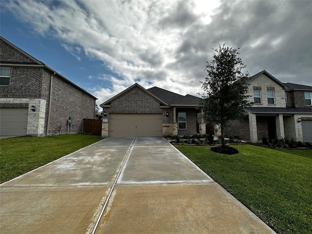 view of front of property with brick siding, an attached garage, concrete driveway, and a front lawn