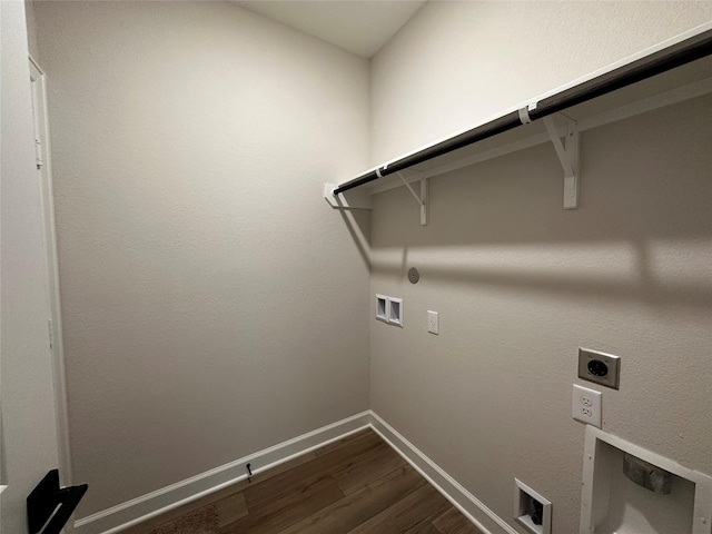 clothes washing area with hookup for a washing machine, baseboards, laundry area, dark wood-style flooring, and electric dryer hookup