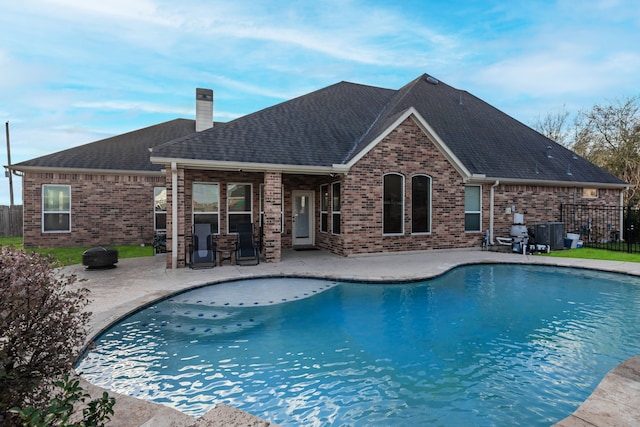 view of pool featuring a fenced in pool, a patio, and fence