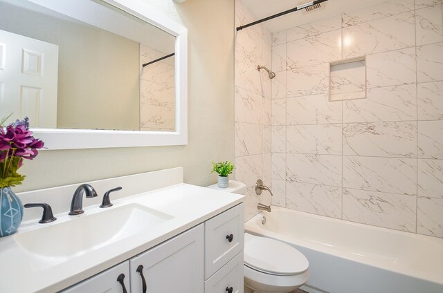 5343 Linda Ln, Katy, TX 77493 - full bathroom featuring bathing tub / shower combination, toilet, and vanity