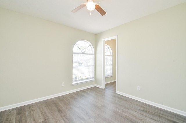 5343 Linda Ln, Katy, TX 77493 - empty room with baseboards, ceiling fan, and wood finished floors