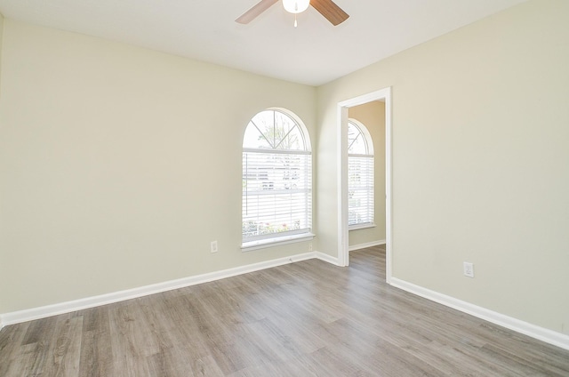 5343 Linda Ln, Katy, TX 77493 - spare room with wood finished floors, baseboards, and ceiling fan