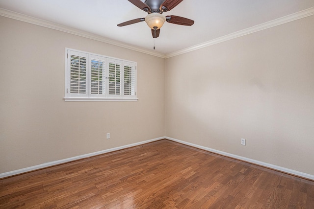 unfurnished room featuring ceiling fan, baseboards, wood finished floors, and ornamental molding