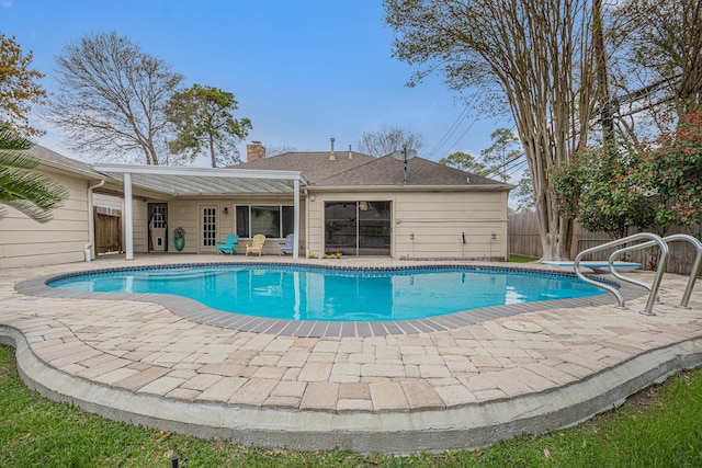 view of pool featuring a fenced in pool, a patio, and fence